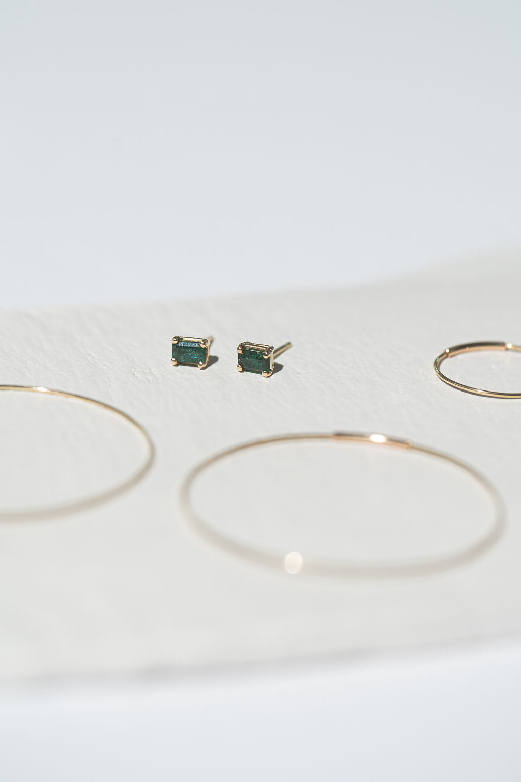 Emerald stud earrings - 14k